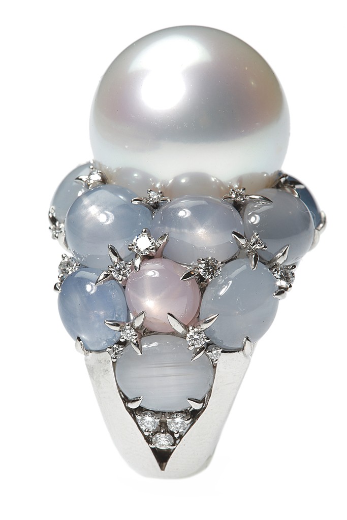 Celestia ring with a round white South Sea pearl, star sapphires and diamonds.Photo by John Aquino